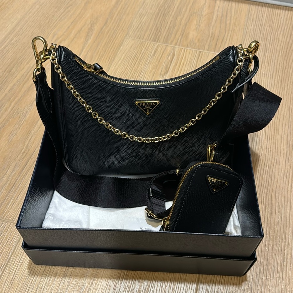 Prada re-edition in saffiano leather black with gold hardware